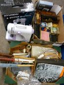 Boxed Hyundai electric sewing machine with foot pedal, a quantity of vintage tins, playing cards,