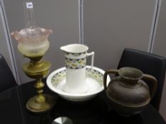 Vintage brass oil lamp with cranberry frill shade (chipped), a Victorian wash jug and bowl and a
