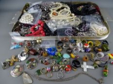 A good selection of vintage and later costume jewellery and rings including a miracle brooch, enamel