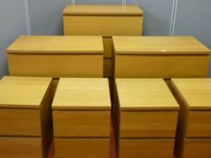 Seven various modern lightwood chests and a circular topped table