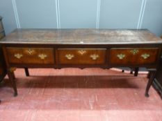 Shropshire oak three drawer dresser base, circa 1830 oak lined with original brassware, 186 cms