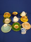 Eight Aynsley bone china cabinet cups and saucers, mainly fruit decorated interiors, a small blue
