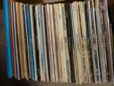 A collection of vintage LP and 45rpm records, artists include Hawkwind, Scott Joplin, Bob Dylan,