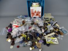 A box of vintage buttons and a boxed Coalport china tea canister