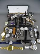 A collection of mainly gent's wristwatches including Rotary, Adidas, Sekonda, Pulsar etc