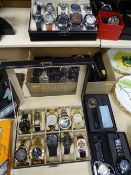 Approximately thirty modern mainly gent's fashion watches, in apparently as new condition