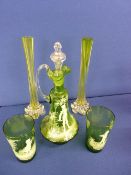 Green glass decanter and two beakers, decorated Mary Gregory style and a pair of long stemmed vases