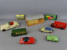 A group of vintage tinplate and diecast motor vehicles mainly clockwork including a Schucco