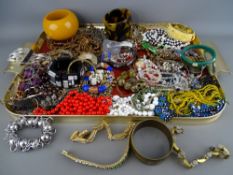 A good quantity of vintage and later costume jewellery, bangles etc