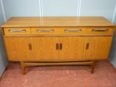 Excellent G-Plan teak dining suite of sideboard, extending dining table and six chairs, 85 cms high,