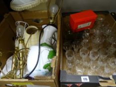 A quantity of good drinking glassware, six colourful sundae dishes, a pair of modern brass table