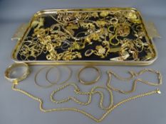 A good tray of yellow metal jewellery, some items marked