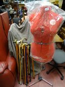 An as new boxed tailor's dummy and a quantity of walking sticks