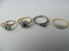 Three 9 carat gold dress rings and one other including a cross over two diamond in illusion setting,