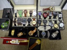 Approximately thirty modern mainly gent's fashion watches, in apparently as new condition