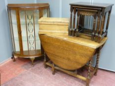 A vintage oak drop leaf dining table, a bow front china cabinet, side tables, pine lidded box etc