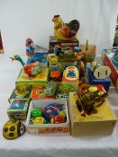 Collection of tinplate, clockwork and other animals, birds and figures etc, many with original
