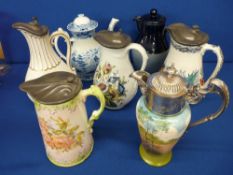 Collection of mainly Victorian transfer decorated jugs and a blue and white decorated teapot