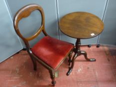 A Victorian mahogany tilt top tripod table and a mahogany balloon back dining chair
