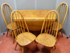 Ercol drop leaf dining table, 73 cms high, 130 cms wide, 64 cms deep (closed) and four high backed