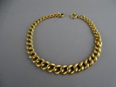 A nine carat gold curb link bracelet, 20 grms, 32 cms long (one circular end link replaced, possibly