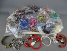 A good selection of vintage and later costume jewellery and bangles etc