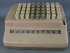 A vintage plus desk calculator