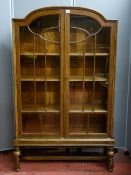 Glazed two door vintage domed top bookcase with interior adjustable shelves, 150 cms high x 91 cms