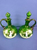 Pair of Victorian decanters with stoppers with Mary Gregory style decoration and rough pontil bases