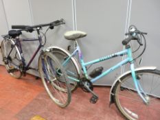 Two multi geared touring bikes