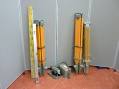 A vintage surveyor's scope with wood and metal tripod stand and a later model etc