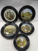 Five Pratt ware pot lids in ebonized frames
