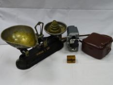 Mauchline ware thimble box, a Eumig servomatic cine camera in case and a vintage set of scales and