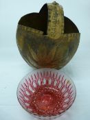 Primitive carved nut basket and a ruby red glass bowl