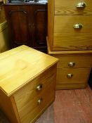 Three modern pine two drawer file cabinets, 59 cms high, 53 cms wide and an entertainment cabinet