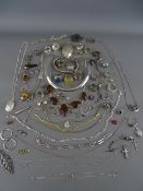 A good selection of silver and white metal jewellery and rings over 5 troy ozs of weighable sterling