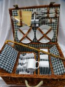 Fitted wicker picnic basket and a vintage walking stick
