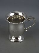 A silver christening tankard, Birmingham 1966, 3.5 troy ozs, 9 cms high to top of handle, (