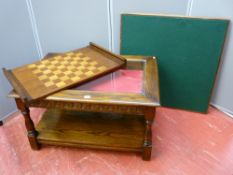 A Priory style oak two tier coffee table with chess board top and storage drawer, 48 cms high x 83