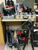 An SLR Digital and video camera collection and equipment including a cased Zenit-E with various