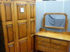 Arts & Crafts style wardrobe, single door with later added silver dialled clock to front and a