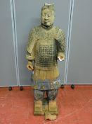 A standing reproduction figure of a terracotta warrior, 107 cms high