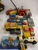 Quantity of mainly vintage tinplate clockwork and friction action cars, trucks and motorbikes