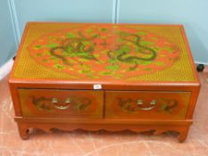 A modern Oriental red and dragon decorated two drawer coffee table, 42 cms high x 83 cms wide