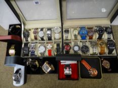 Approximately thirty modern mainly gent's fashion watches, in apparently as new condition