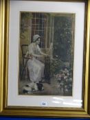Gilt framed colour tinted print of a young woman at a spinning wheel in a garden setting with her