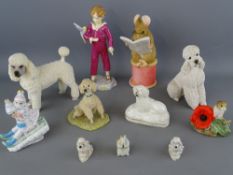 A group of poodle figurines by Wade etc, a Beatrix Potter figure 'The Tale of Gloucester', a