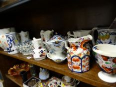 A collection of 19th Century pottery jugs including a large painted example dated 1837, a damaged