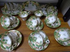 A thirty five piece Victorian green and gilt decorated part-teaset