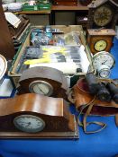 Group of vintage mantel clocks, a pair of Russian binoculars (cased) and a quantity of decorator's
